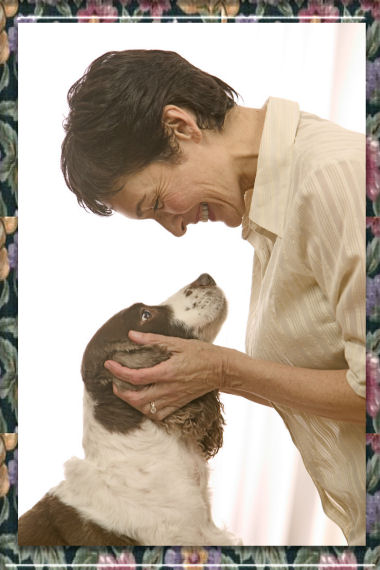 A woman hugging a dog