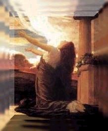 Photograph of a woman raising her hands and praising the Lord