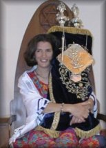 Woman holding Torah